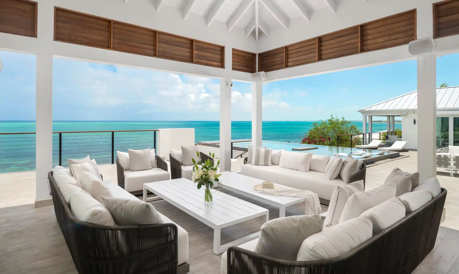 Gazebo featuring amazing views of the ocean complimented with cozy outdoor furniture
